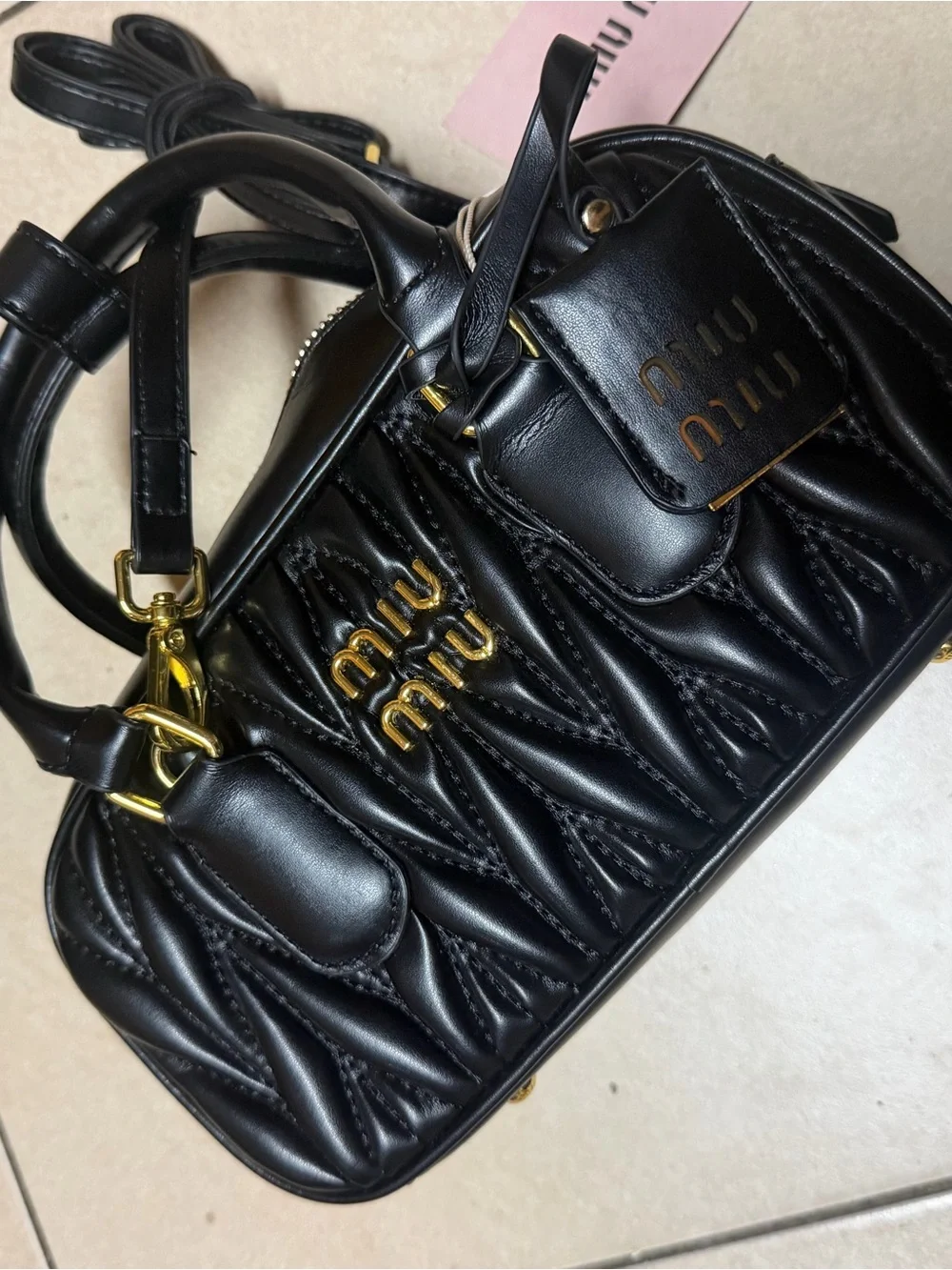 Miu Miu Black Quilted Leather Satchel with Gold Hardware